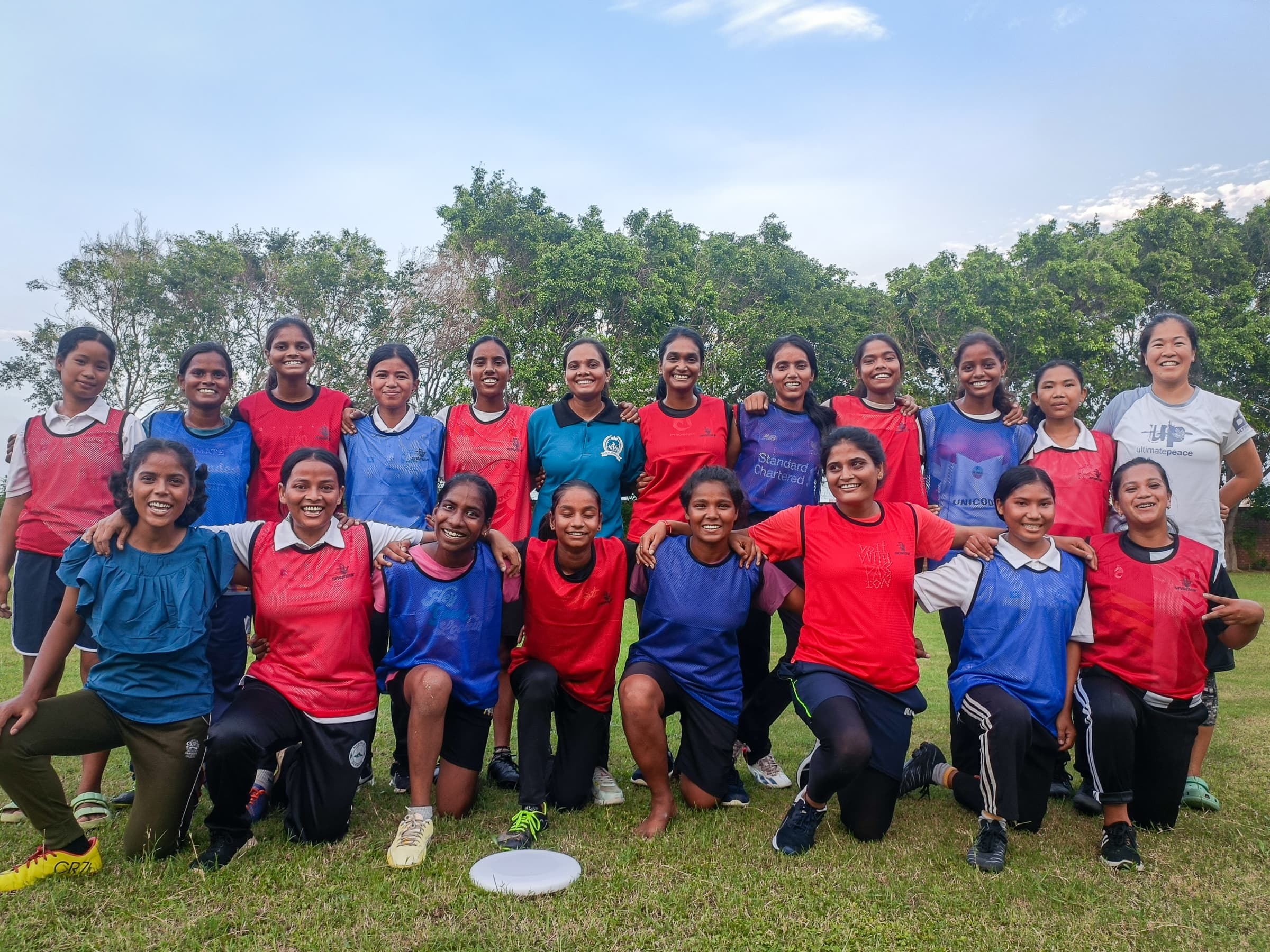 Young women learning Ultimate Frisbee leadership skills